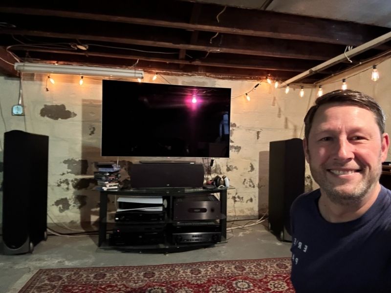 Scott in his listening room with Paradigm Reference speakers